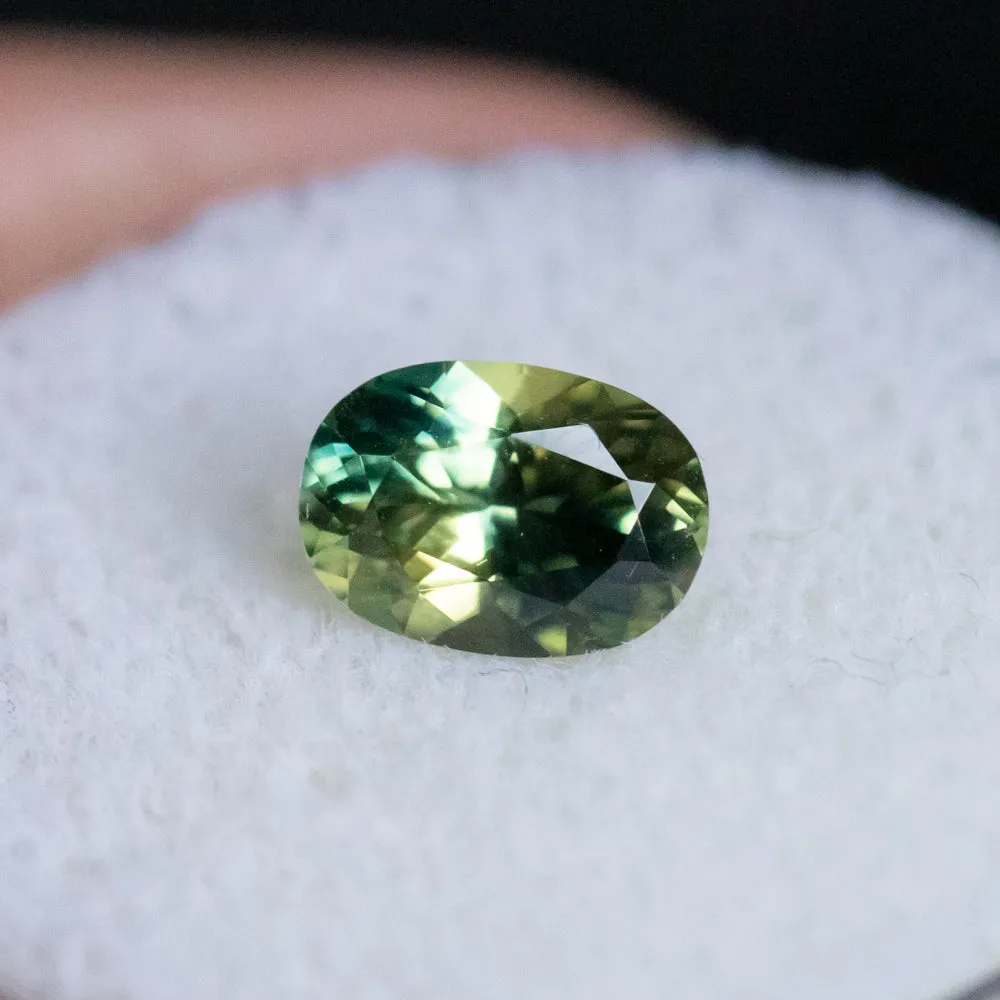 1.25CT AUSTRALIAN  OVAL SAPPHIRE, UNTREATED, PARTI GREEN BLUE YELLOW, 7.75X5.5X3.79MM