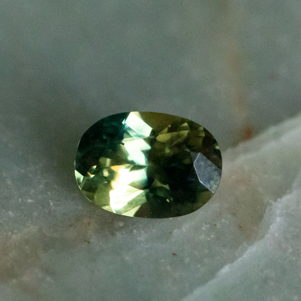 1.25CT AUSTRALIAN  OVAL SAPPHIRE, UNTREATED, PARTI GREEN BLUE YELLOW, 7.75X5.5X3.79MM