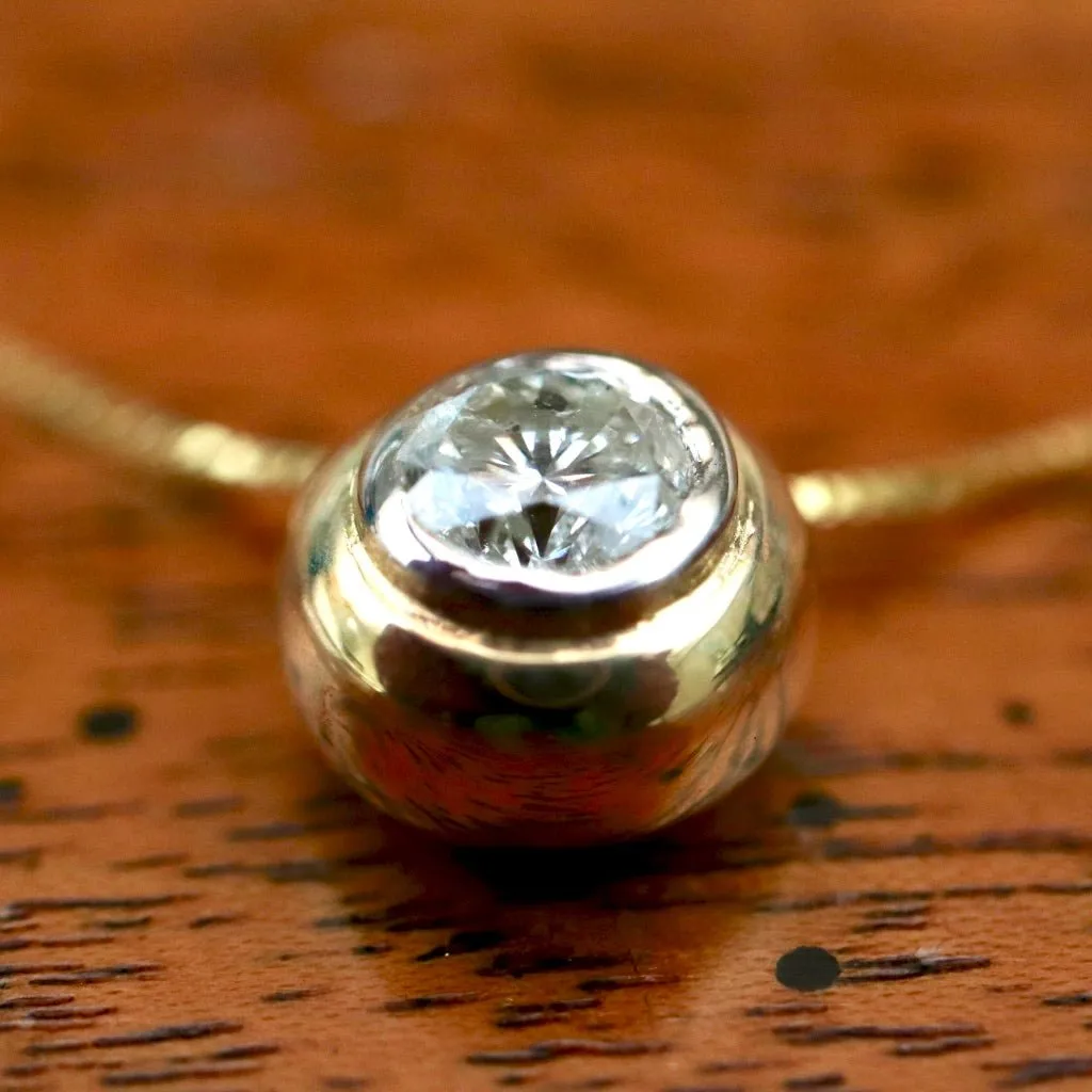 Globe 14k Gold and Diamond Necklace